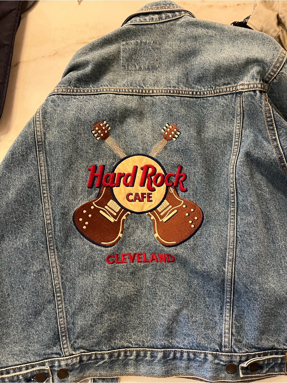 Hard Rock Cafe Denim Jacket with Blue Patch and Light Blue Wash